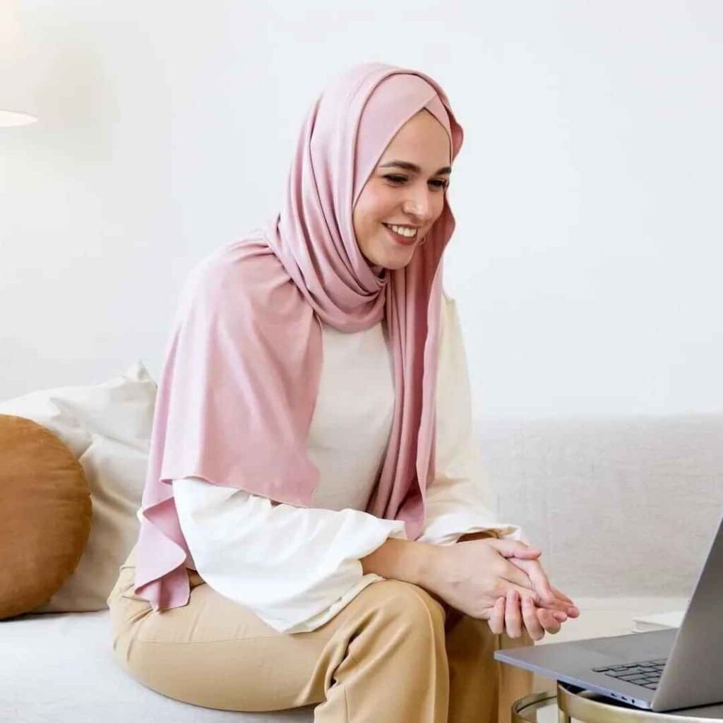Medilife Home Healthcare Dubai Emirates Women and Laptop smiling