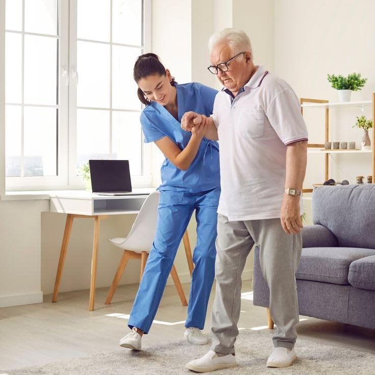 Physiotherapist treating patient during home visit in Dubai